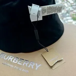 The Burberry Reversible Icon Stripe Cotton Bucket Hat in Archive Stripes + Black Burberry Reversible Icon Stripe Cotton Bucket Hat | eBay main image 2